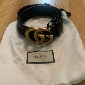 Gucci GG belt. Black/Gold. Sz: 75